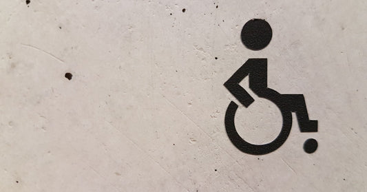 Caregiver supporting wheelchair user with independent care
