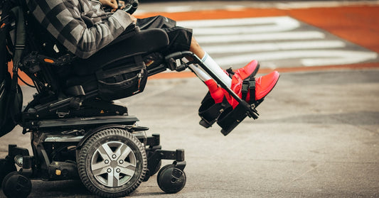 Wheelchair user navigating accessible bathroom