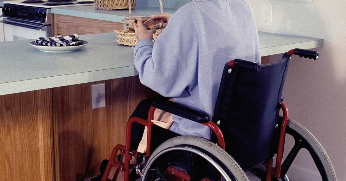 Female wheelchair user managing health independently