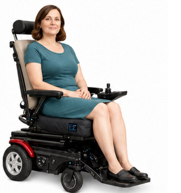 A woman seated comfortably in her wheelchair using the EZ-P system discreetly